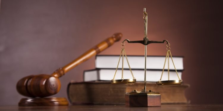 Scales of justice with ambient light